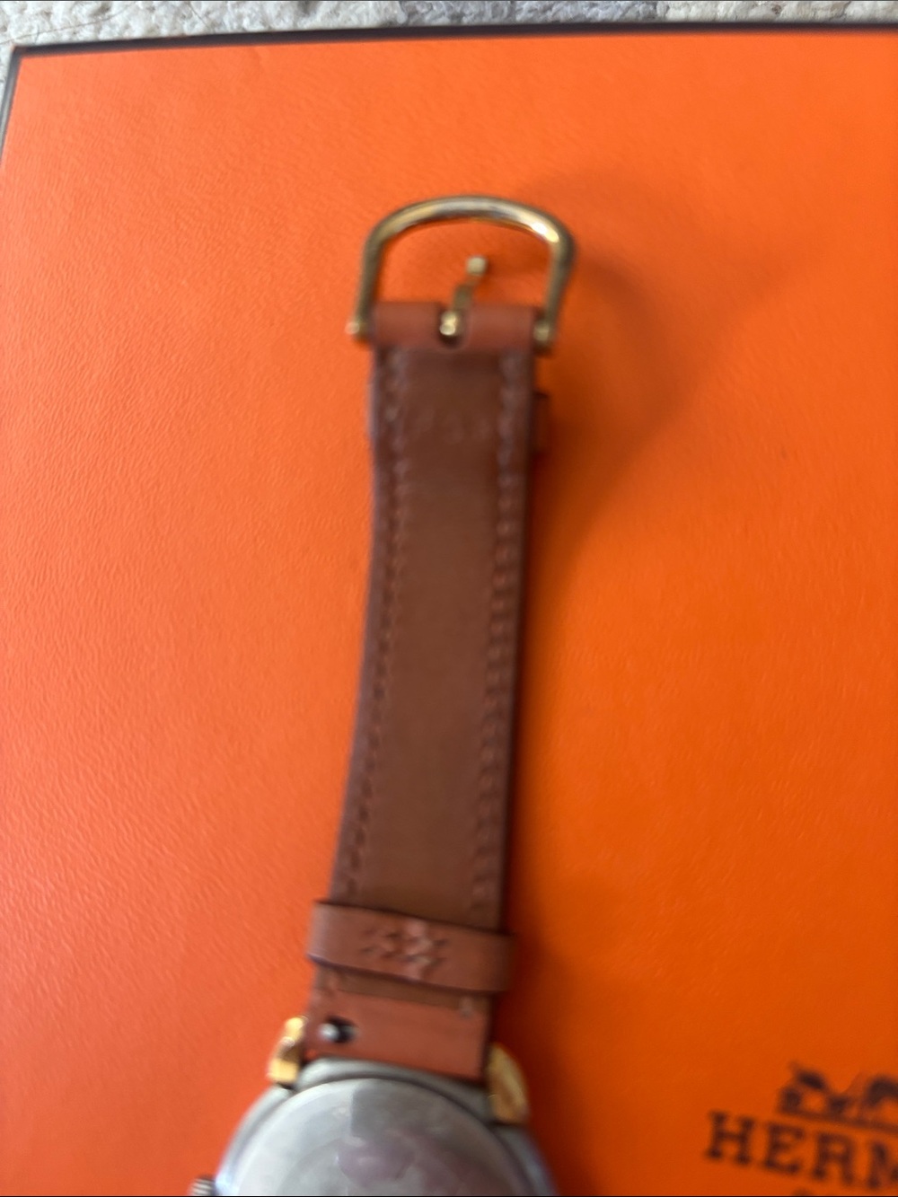 Authentic Hermès orange Leather Strap Gold and silver Tone Round Dial Watch - Picture 4 of 7
